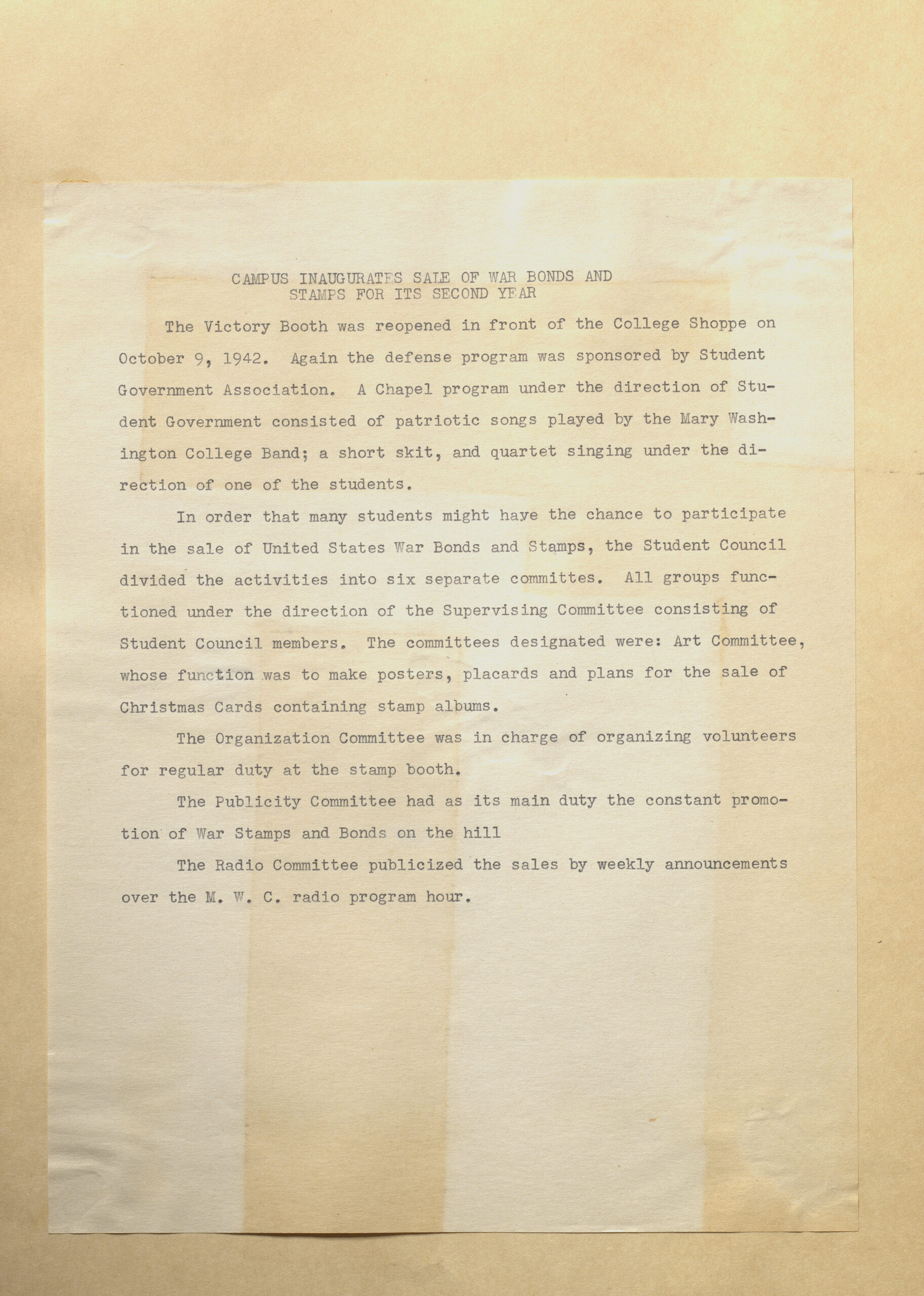 Page with a report about the sale of war bonds and stamps.